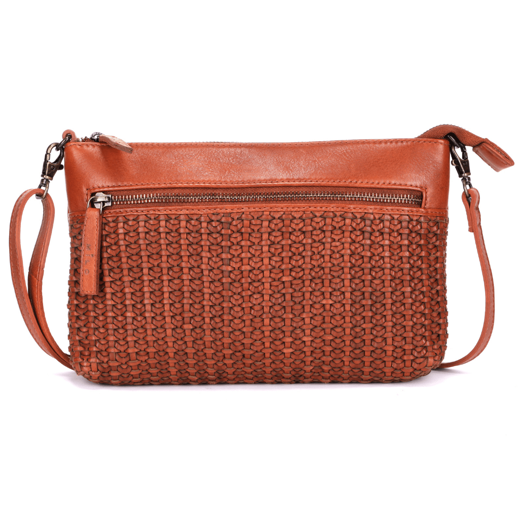 Small crossbody purse with braided front detail on white background.