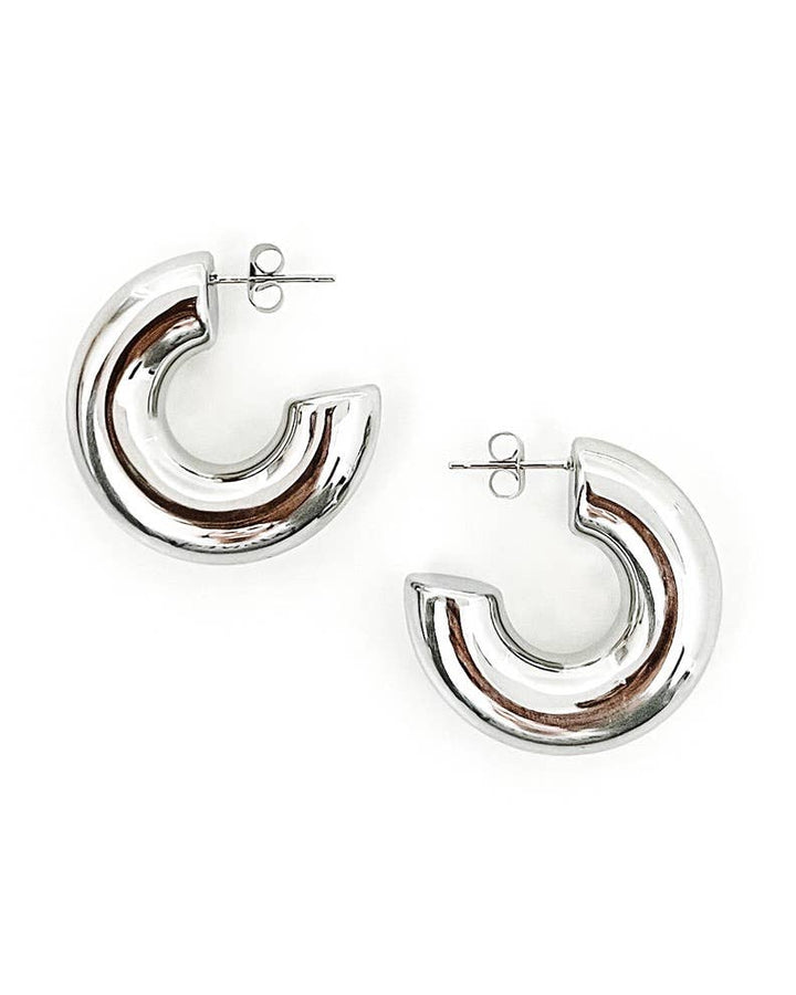 Silver hoop earrings on a white background