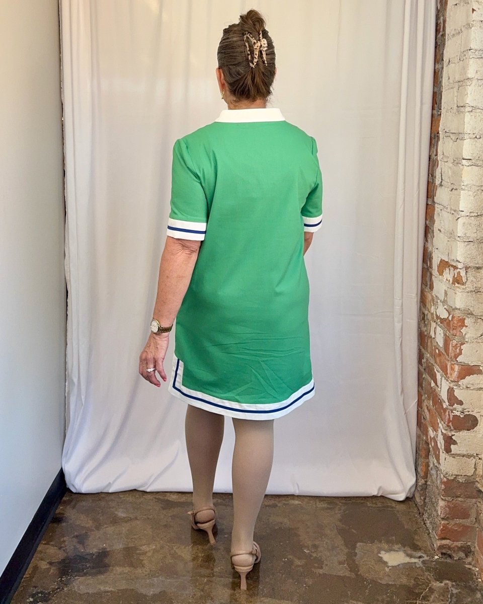 Carole Christian Contrast Trim V-Neck Shift Dress in Green — full back view showing contrast trim hem border and side slits, model wearing Small, Modish Maven Boutique