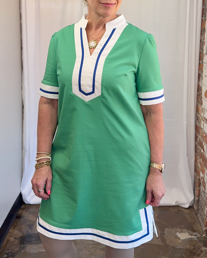 Carole Christian Contrast Trim V-Neck Shift Dress in Green — close-up front view showing split V-neckline placket, contrast sleeve trim, and linen-viscose fabric texture, model wearing Small, Modish Maven Boutique