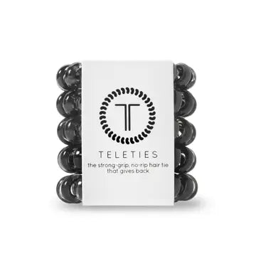 A package of TELETIES tiny black hair ties designed for kids and fine hair.