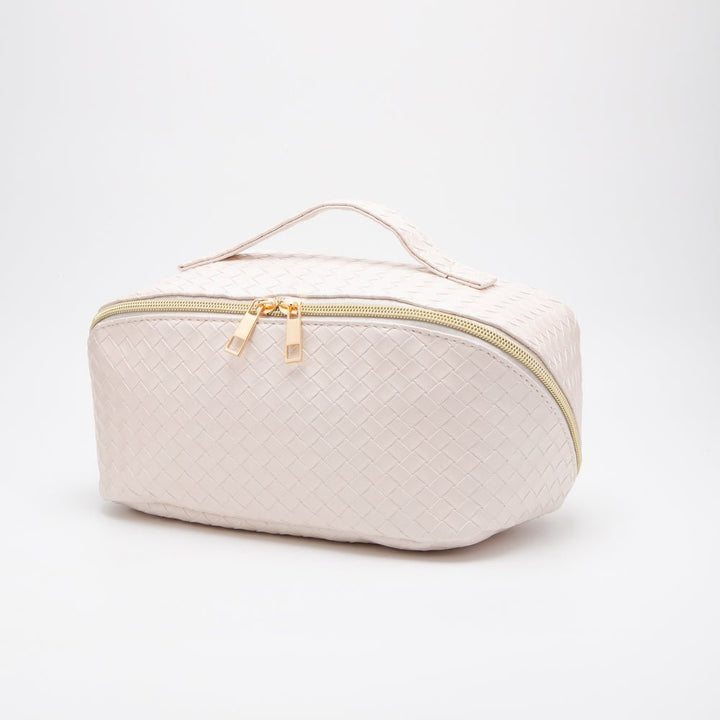 White woven cosmetic bag with gold zipper on a white background