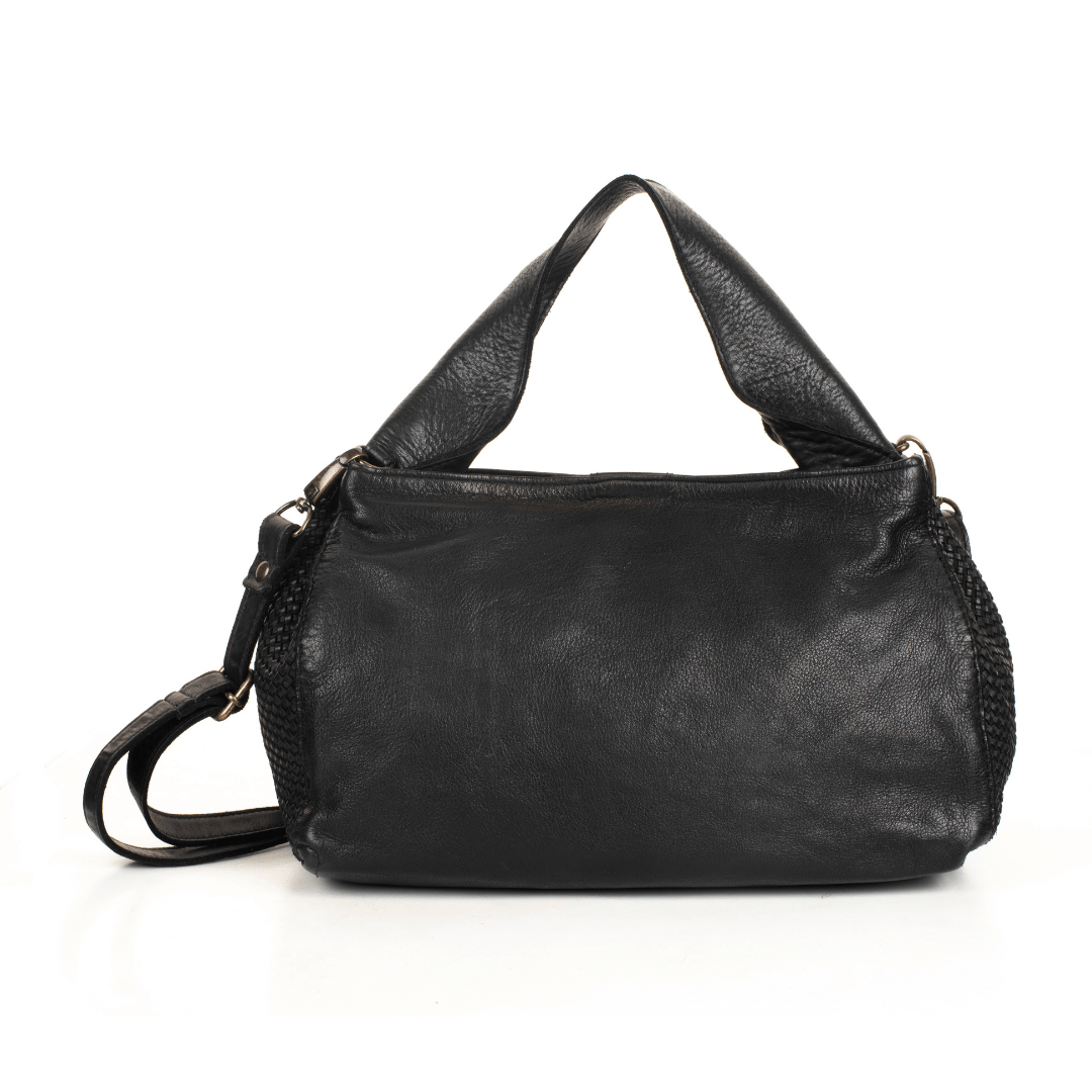 Black leather handbag on white background.
