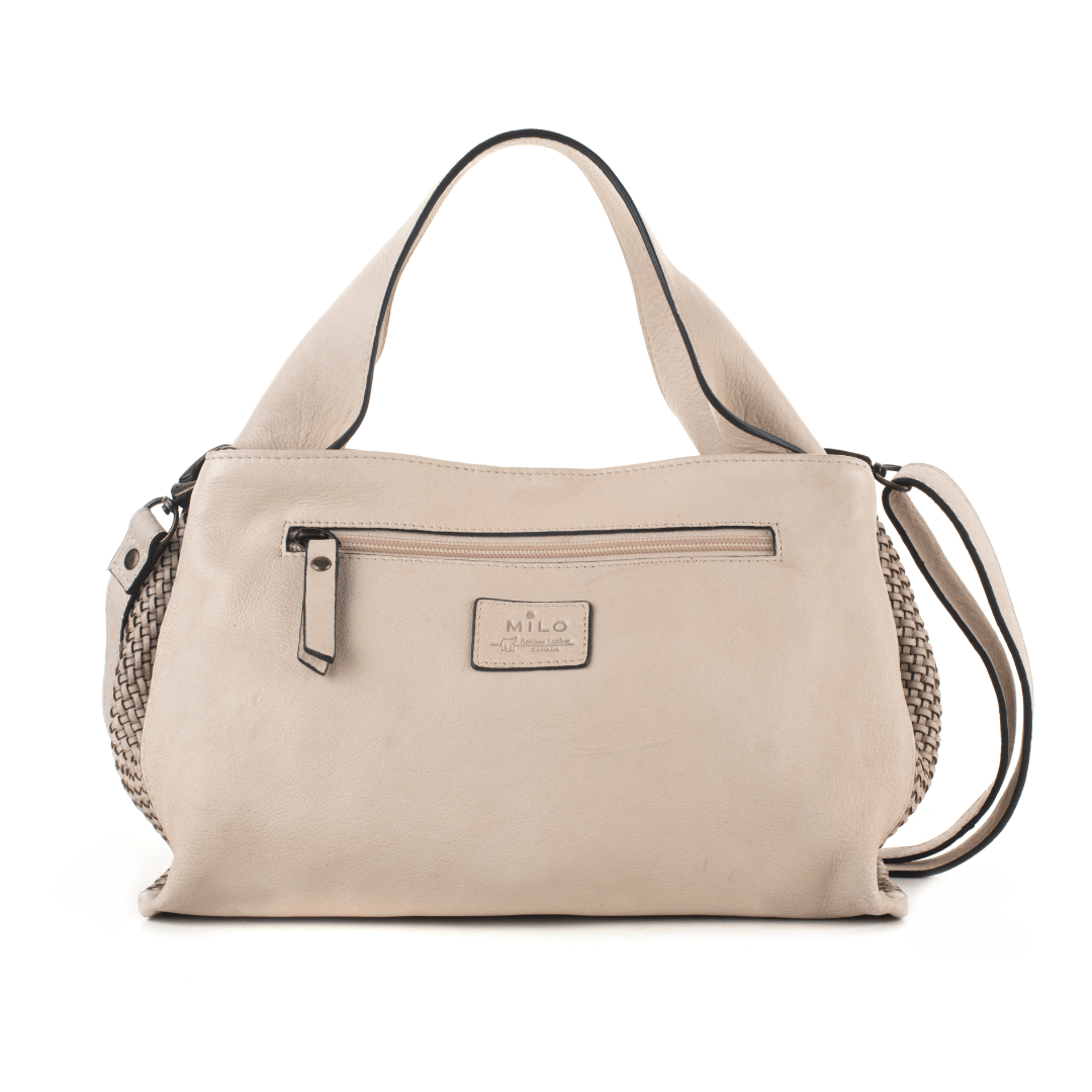 Ivory handbag with front zip pocket on white background.