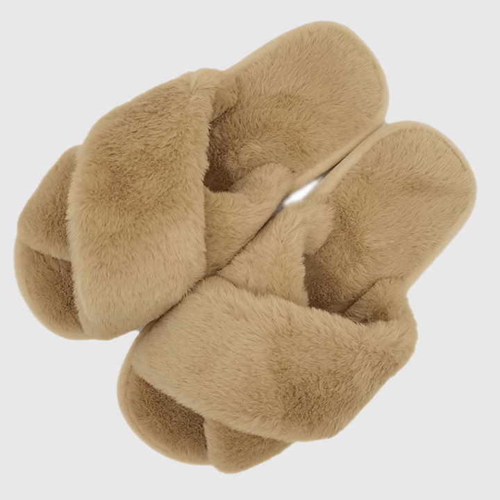 Camel plush fur slippers on a white background.