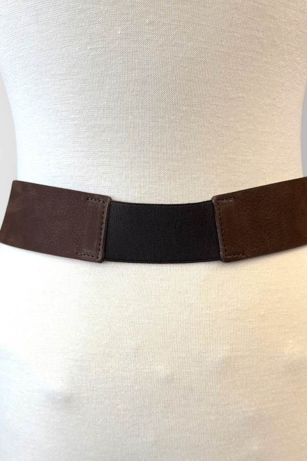 Brown belt on a mannequin with a white background