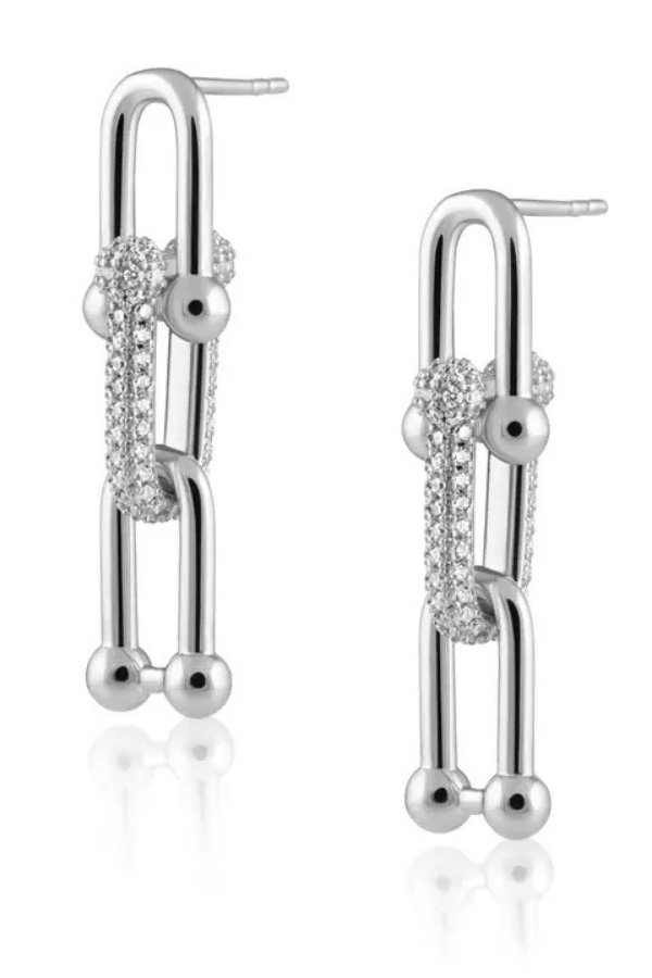 Silver earrings with intricate designs on a white background