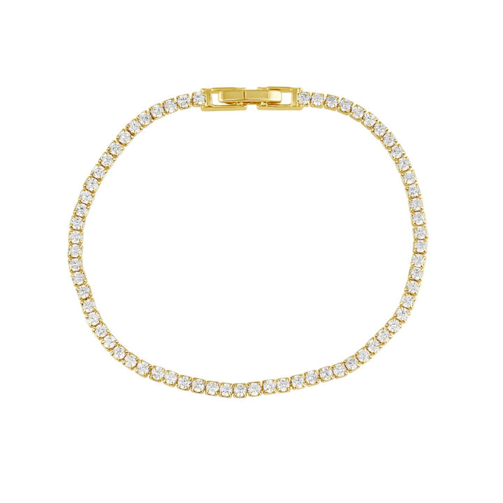 Annie Dainty Tennis Bracelet in Gold — full bracelet flat lay showing clasp and CZ stones