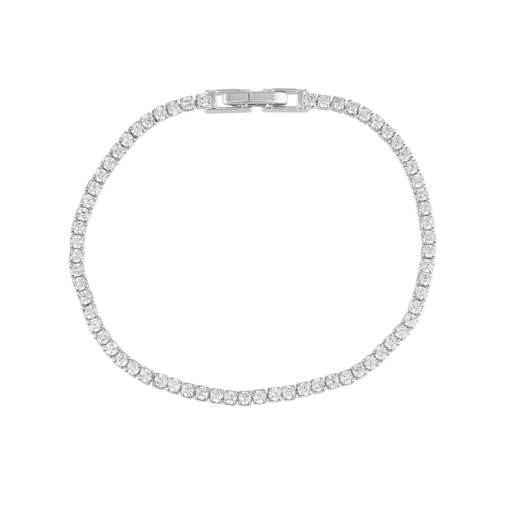 Annie Dainty Tennis Bracelet in Silver — full bracelet flat lay showing fold-over clasp