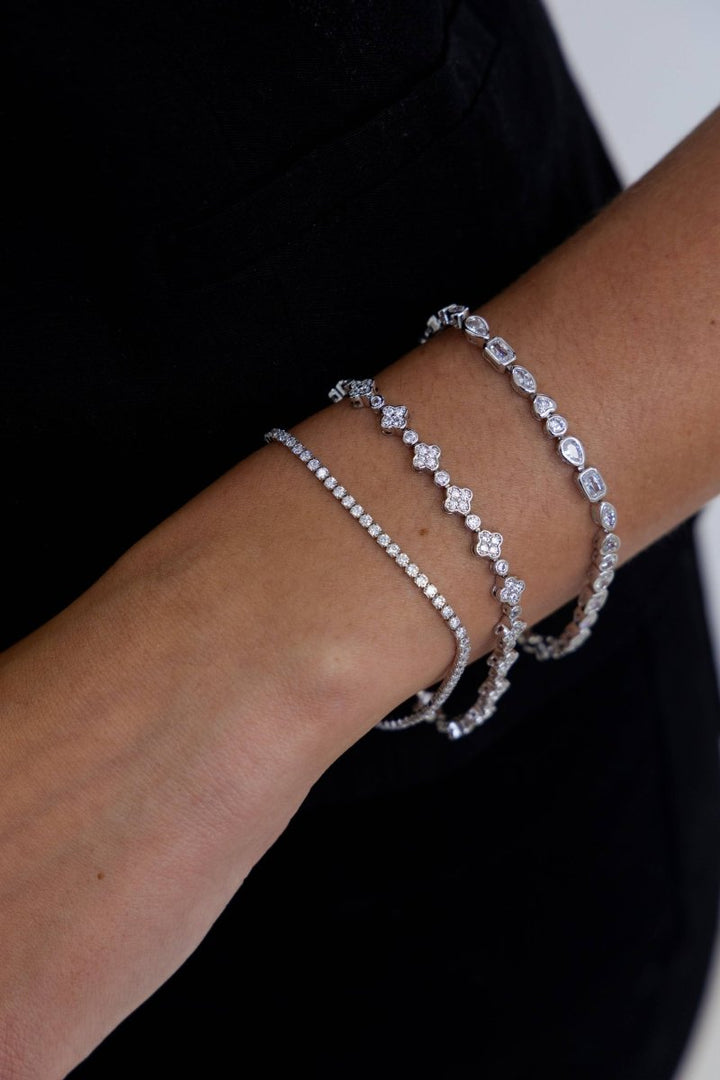 Annie Dainty Tennis Bracelet in Silver — worn with two other sparkling bracelets