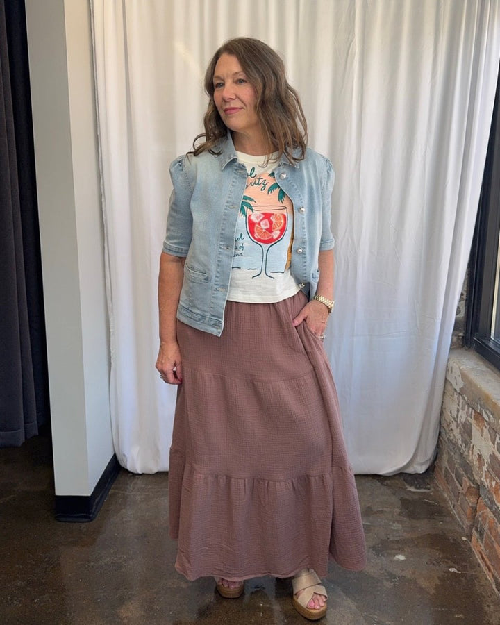 Wildfox Aperol State of Mind Nova Tee in Snow White styled under cropped denim jacket with dusty rose tiered maxi skirt and platform wedge sandals, full outfit front view on model

