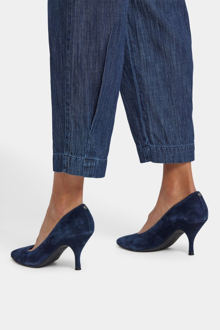 Balloon Trouser Jeans With Pleats in La Mer — hem close-up showing back pleat and trouser-style finish