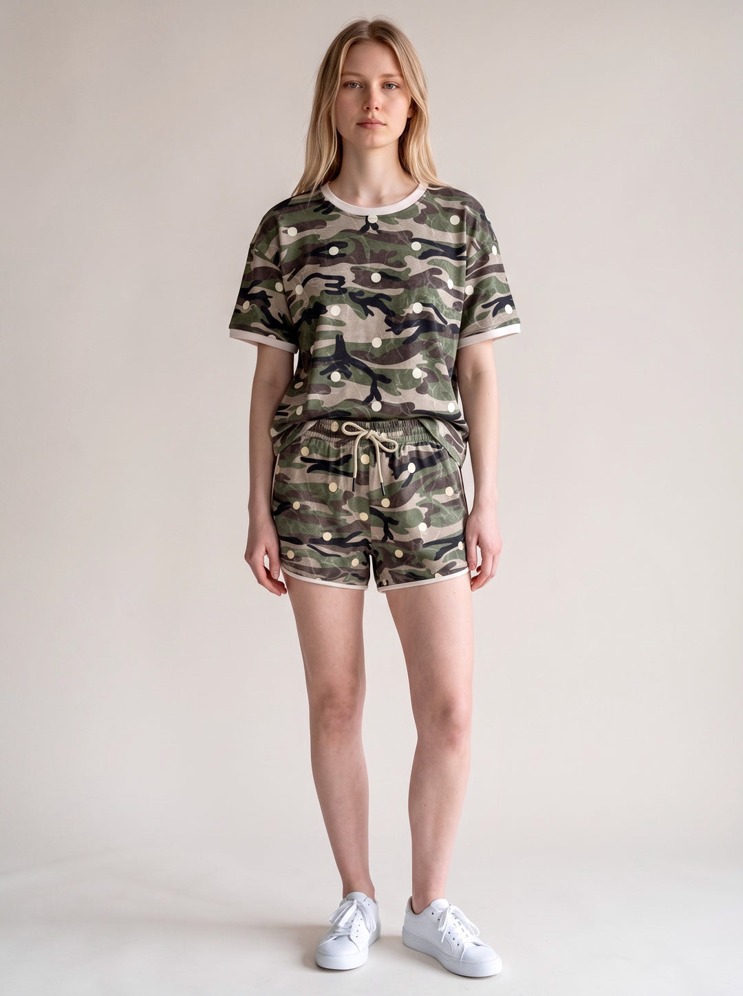 Carole Christian Camo Polka Dot Tee &amp; Shorts Set in Camo — full front outfit view with white sneakers, crew neck tee and matching shorts with blush trim, model wearing Small, Modish Maven Boutique