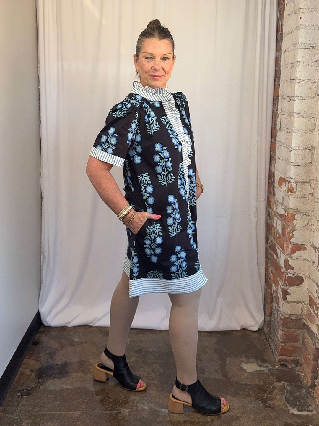 Carole Christian Floral Block Print Shirt Dress in Black/Blue, A-line silhouette with stripe hem band and side pocket, side view on model