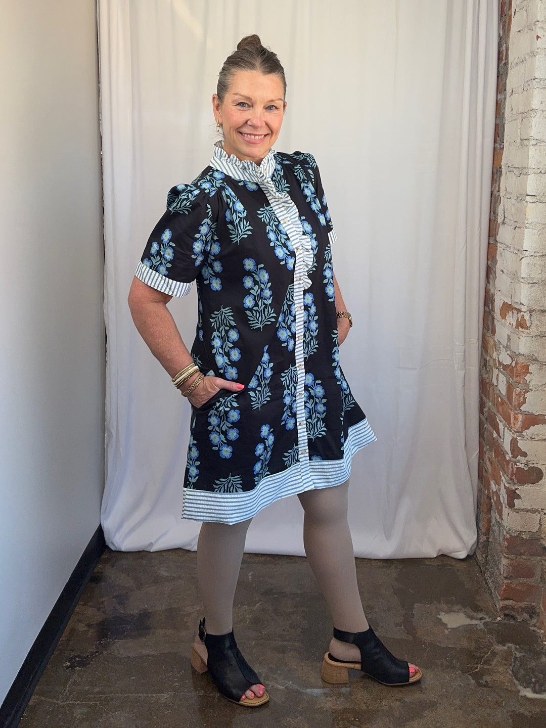 Carole Christian Floral Block Print Ruffle Placket Shirt Dress in Black/Blue, A-line mini with stripe ruffle placket, front view on model