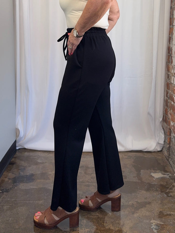 Scuba Modal Split-Collar Wide-Leg Set in Black, relaxed fit with dropped shoulders and wide-leg pant silhouette, front view on model