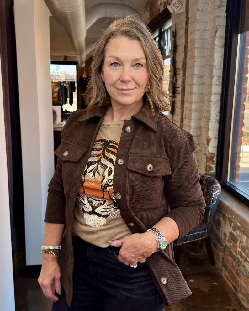 Corduroy Button Front Shacket in Timber Brown, chest patch pockets and silver buttons styled over a tiger graphic tee, front view on model
