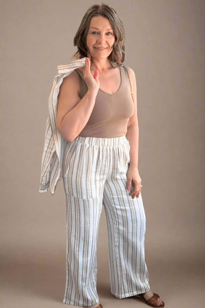 Flowy silhouette of the Eighty-five wide leg gauze pants showcasing the relaxed, loose fit and 30-inch inseam.