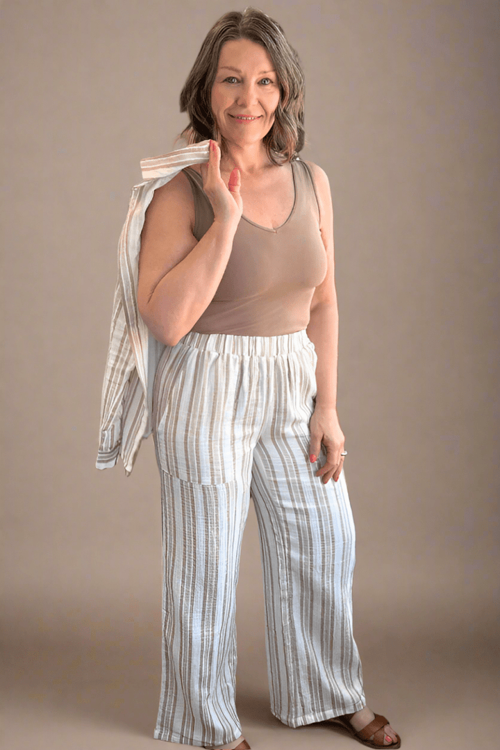 Flowy silhouette of the Eighty-five wide leg gauze pants showcasing the relaxed, loose fit and 30-inch inseam.