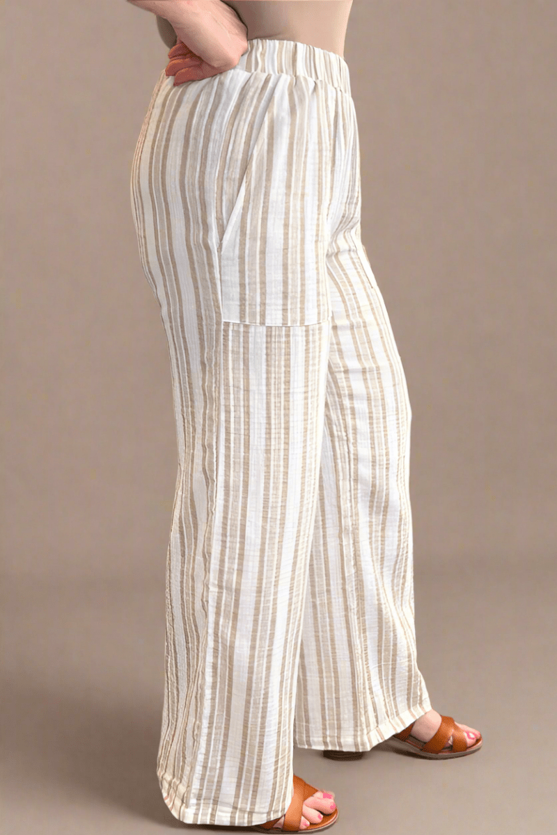 Close-up of the breathable, textured 100% cotton gauze fabric from Eighty-five in a neutral beige shade.
