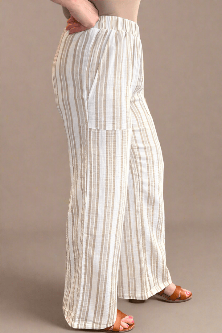 Close-up of the breathable, textured 100% cotton gauze fabric from Eighty-five in a neutral beige shade.
