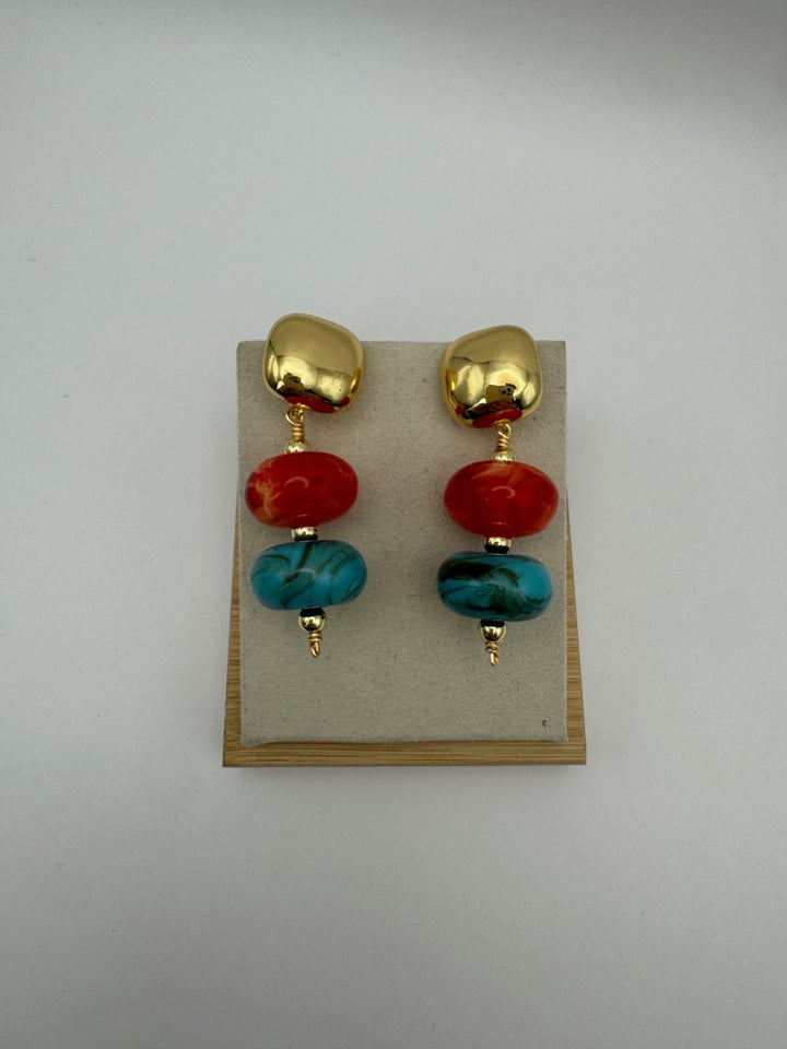 Current Mood Drop Earrings in Sunset — front view on display with gold-tone tops and colorful resin beads