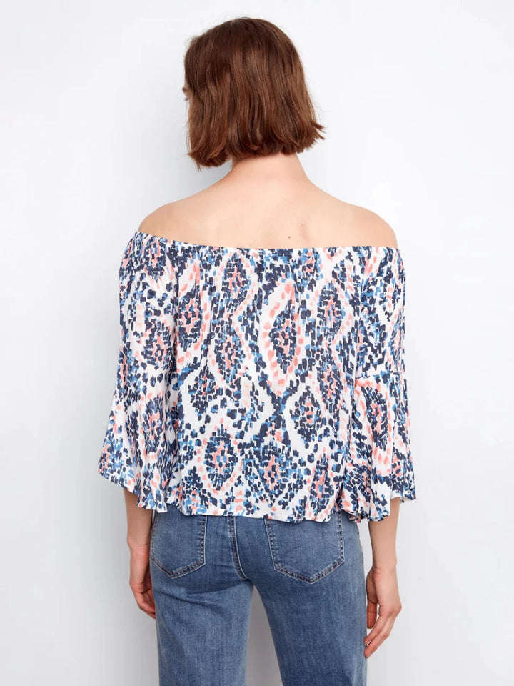 Charlie B Ikat Print Off-Shoulder Bell Sleeve Blouse in Nomad — back view on model