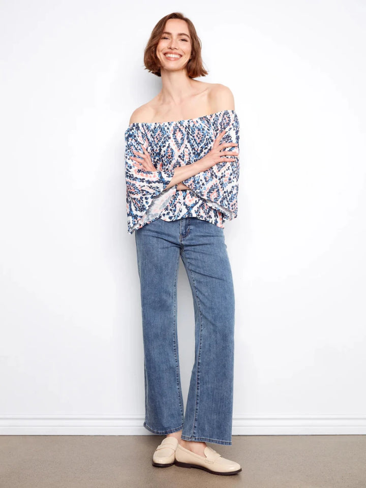 Charlie B Ikat Print Off-Shoulder Bell Sleeve Blouse in Nomad — full outfit view on model, smiling