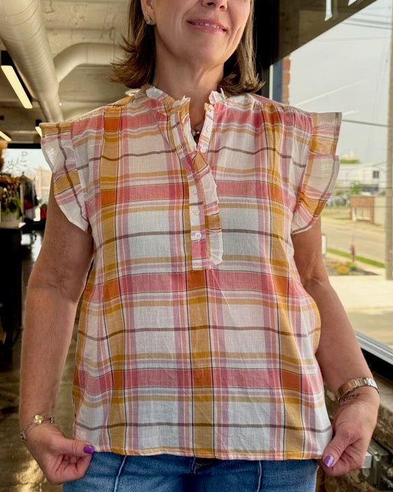Dear John Chatra Plaid Ruffle Top in Picnic Plaid, ruffle neckline and flutter sleeves worn relaxed and untucked, front view on model