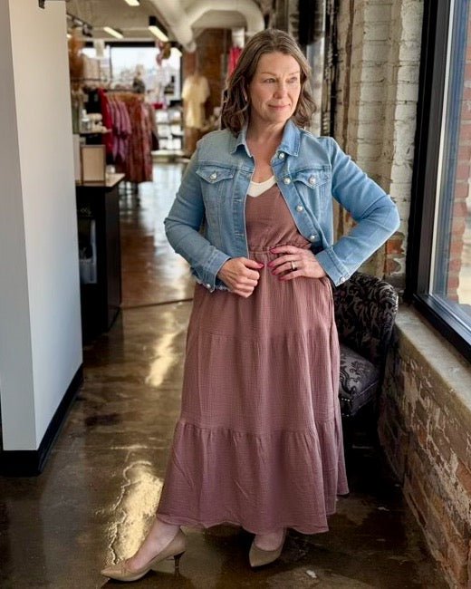 Dex Gauze Tiered Midi Dress in Rose Taupe styled with light wash denim jacket and nude heels, front view on model