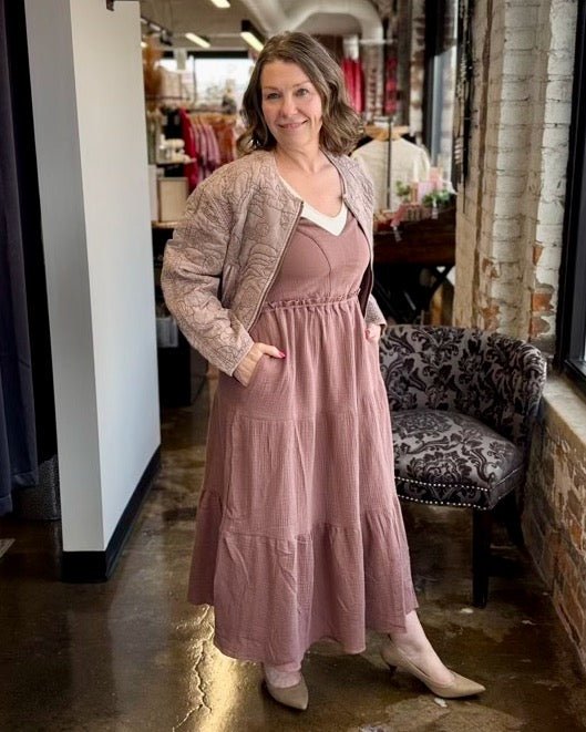 Dex Gauze Tiered Midi Dress in Rose Taupe styled with rose taupe quilted moto jacket and nude heels, full outfit view on model