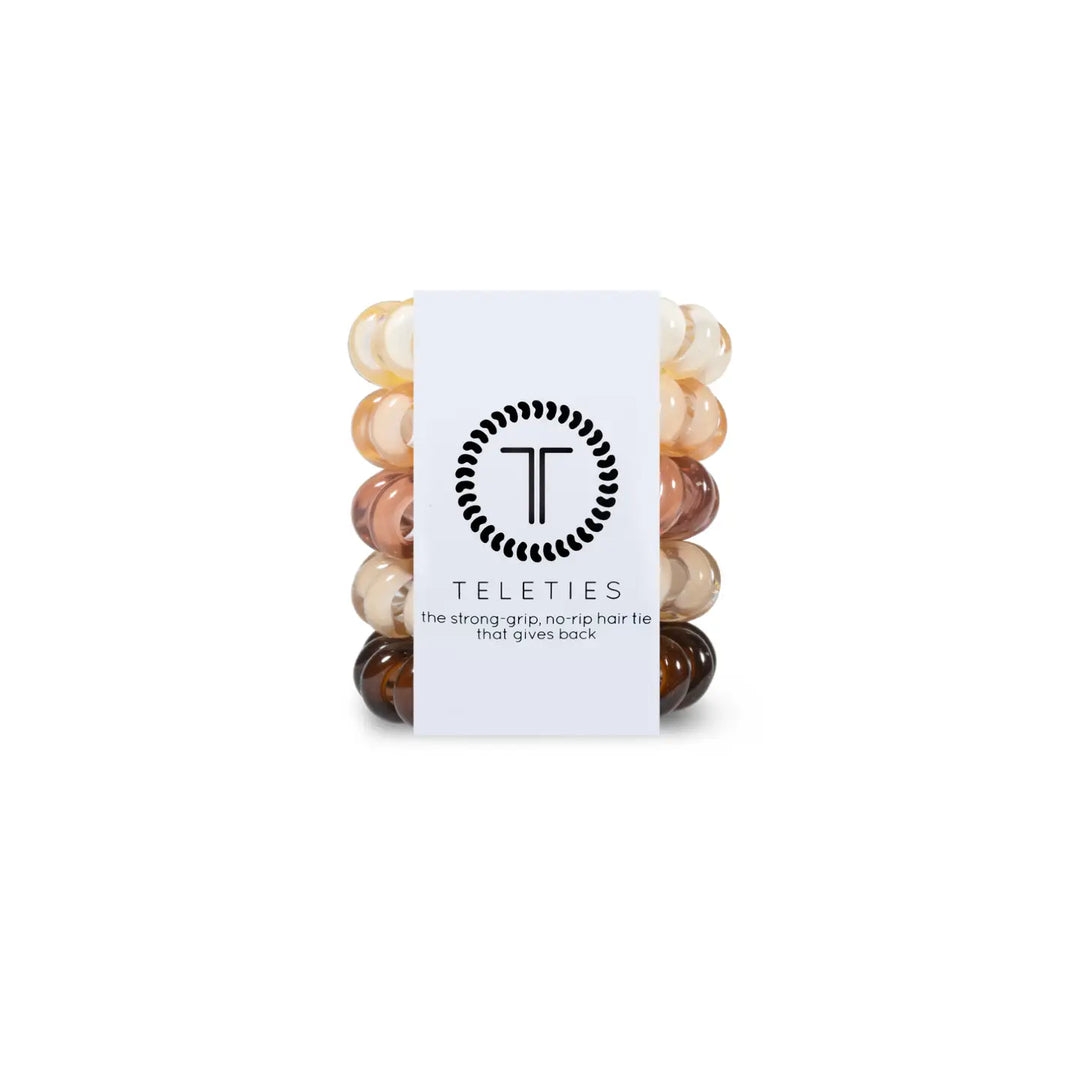 A package of TELETIES tiny brown hair ties designed for kids and fine hair.