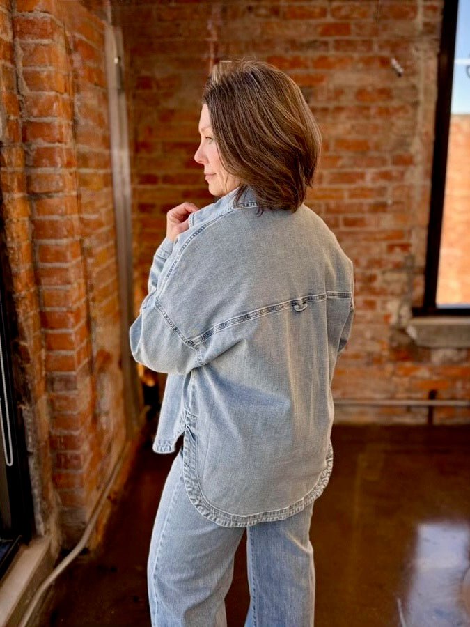 Dear John Denim Gina Relaxed Fit Denim Jacket in Zurie wash, relaxed silhouette with yoke seam detail and curved hem, back view on model
