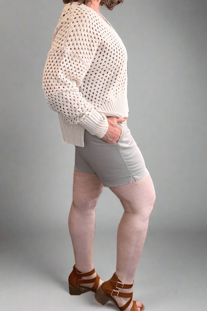 Side view of a woman wearing &