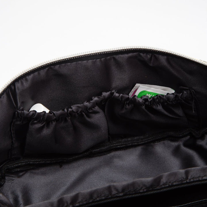 Black bag with a drawstring pocket on a white background