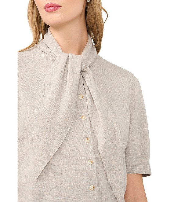 Knit Tie Neck Short Sleeve Cardigan in Warm Grey — close-up on model showing tied neckline and button front