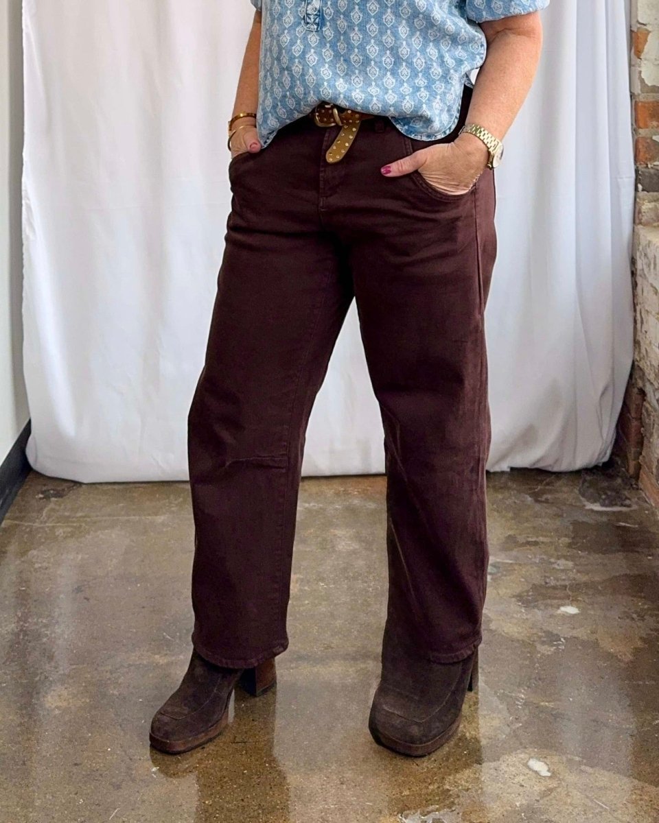 model wearing brown wide leg pants
