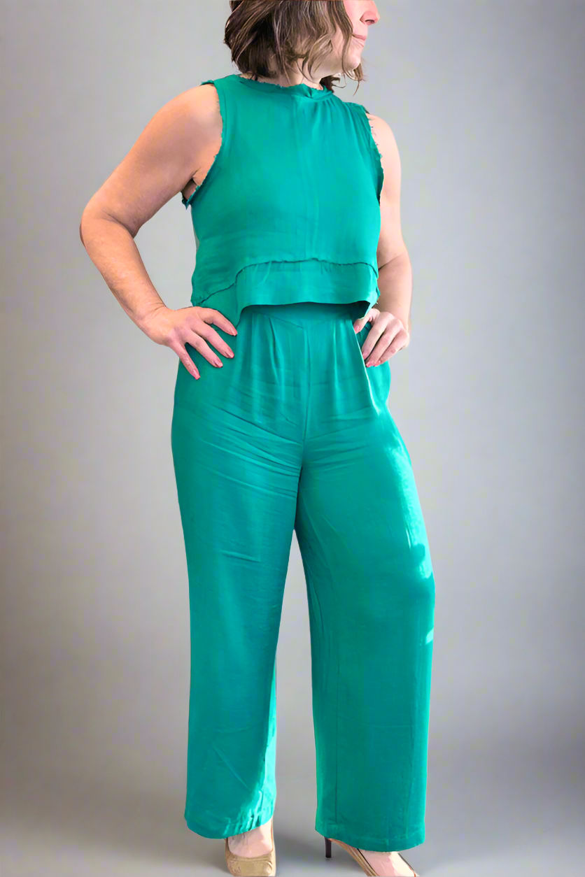 Woman wearing the Jade Green Linen Tank and Wide Leg Pant Set with hand on hip.