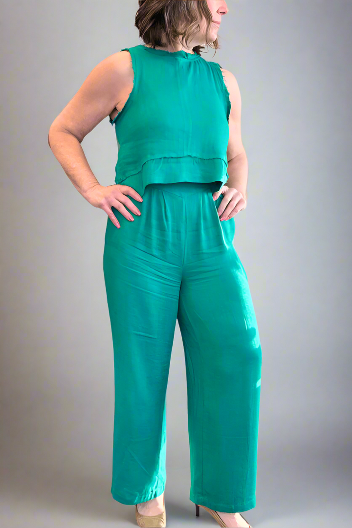 Woman wearing the Jade Green Linen Tank and Wide Leg Pant Set with hand on hip.