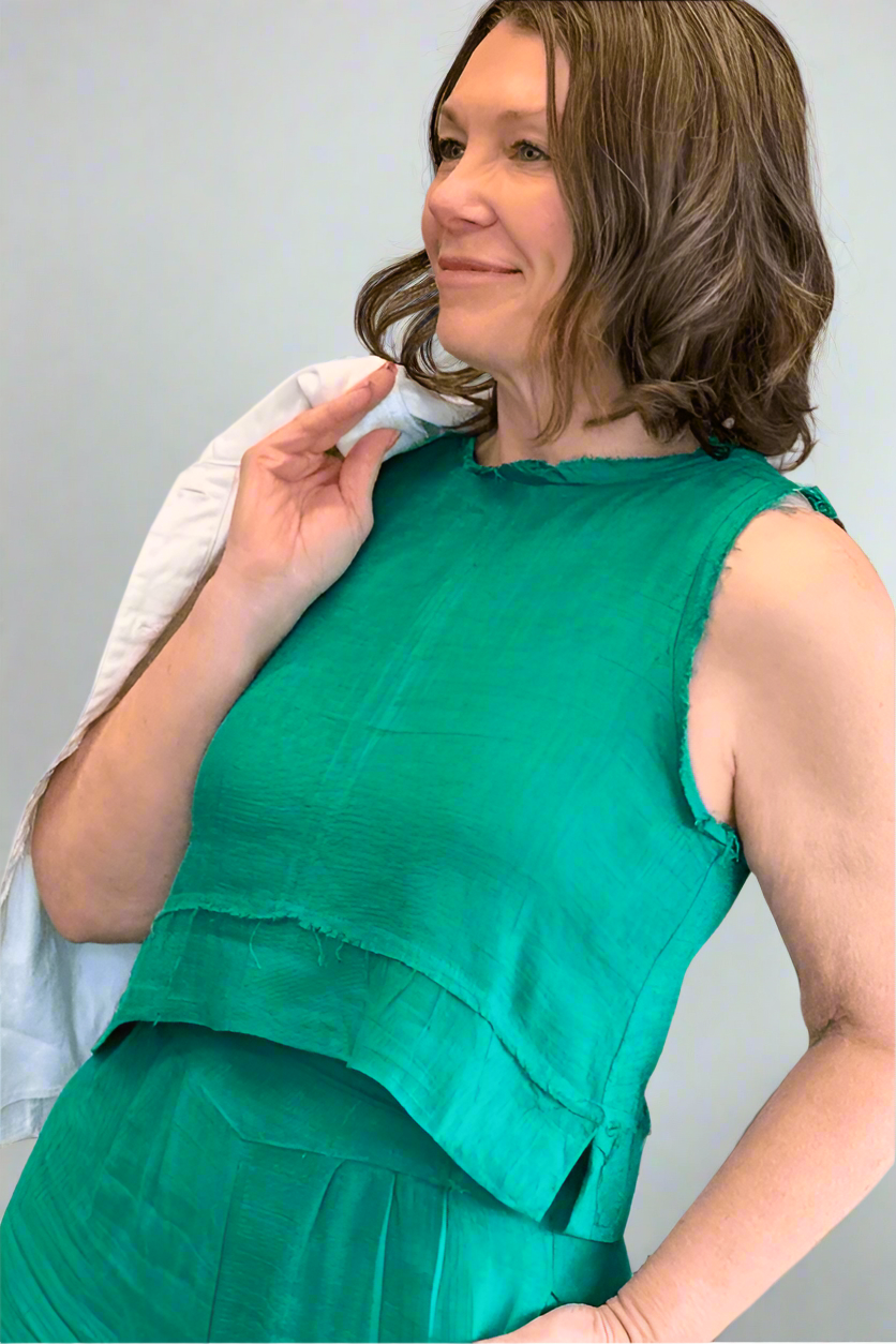 Woman wearing the Jade Green Linen Tank and Wide Leg Pant Set in a close up.