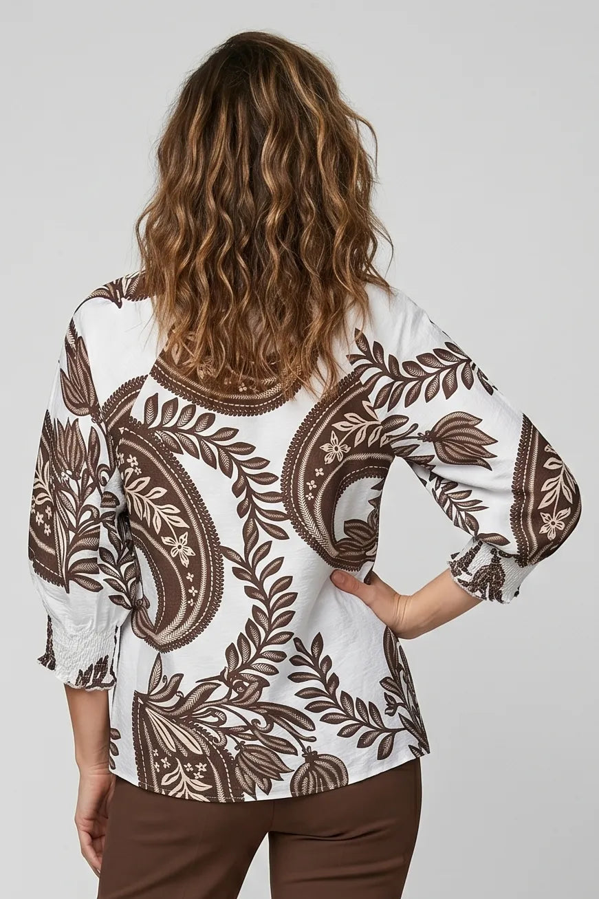 Baroque Print V-Notch Smocked Cuff Top in Brown — rear view showing ornate print and curved hem