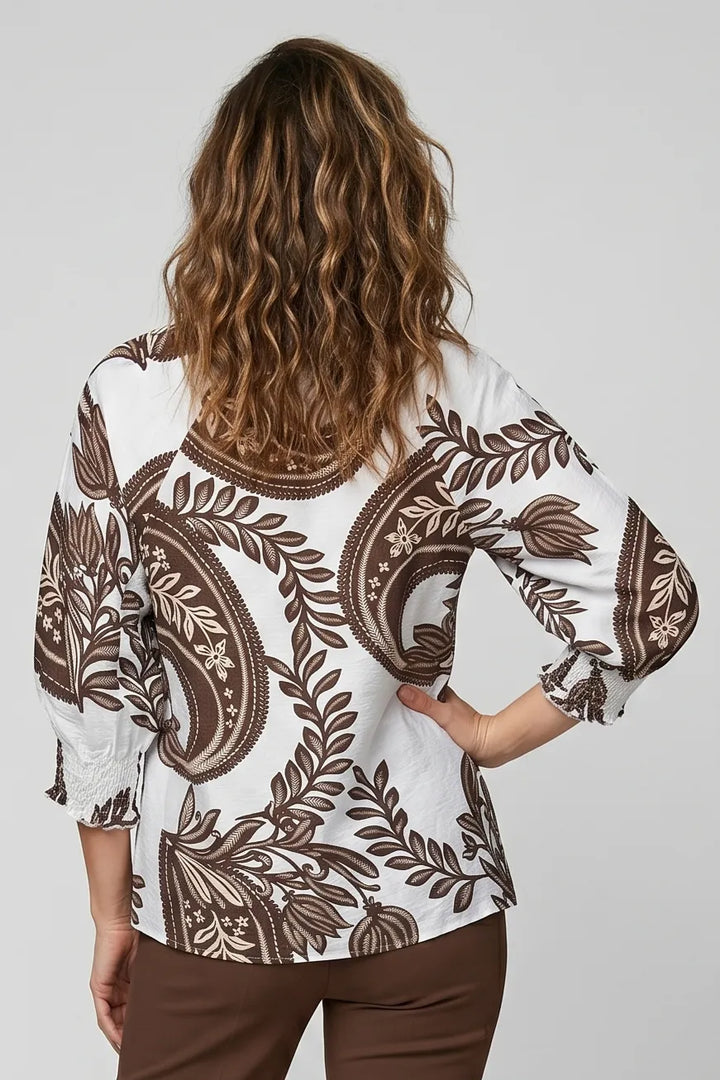Baroque Print V-Notch Smocked Cuff Top in Brown — rear view showing ornate print and curved hem