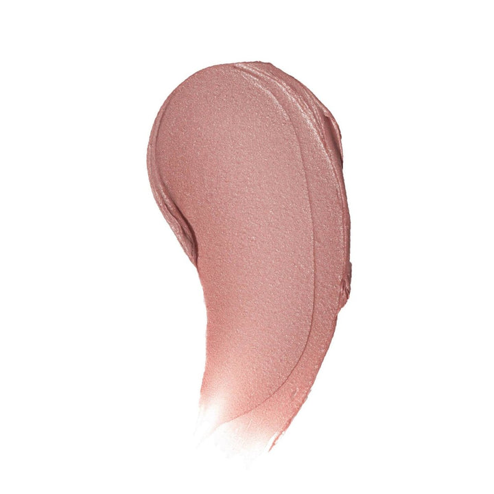 A smooth color swatch of Charlie Lip Tint on white background, displaying the sheer nude pigment and natural, creamy texture.