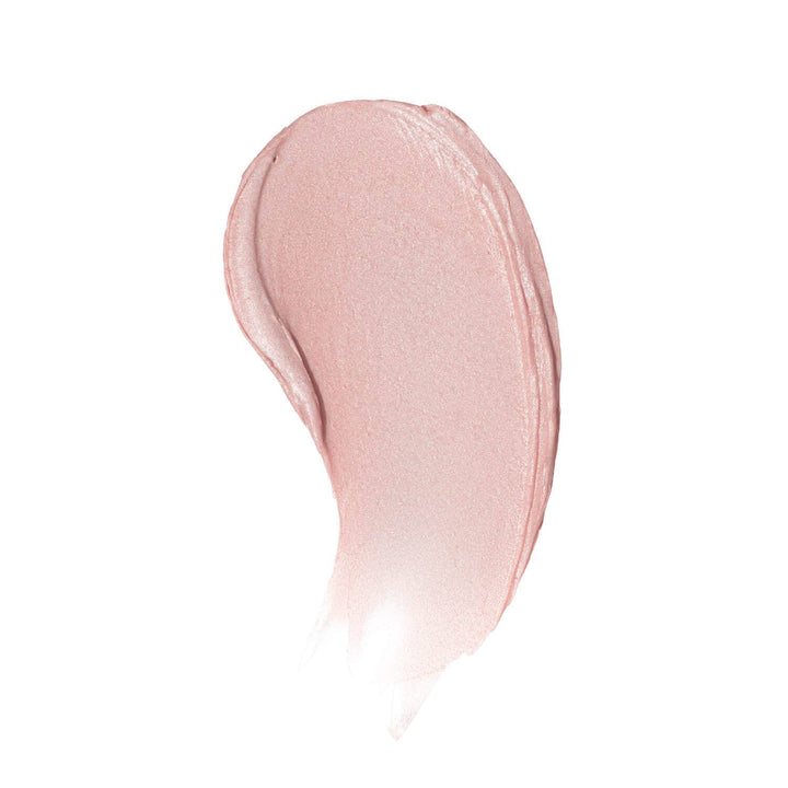 A buttery color swatch of Daisy Lip Tint on a white background, displaying the sheer light pink and smooth, natural texture.