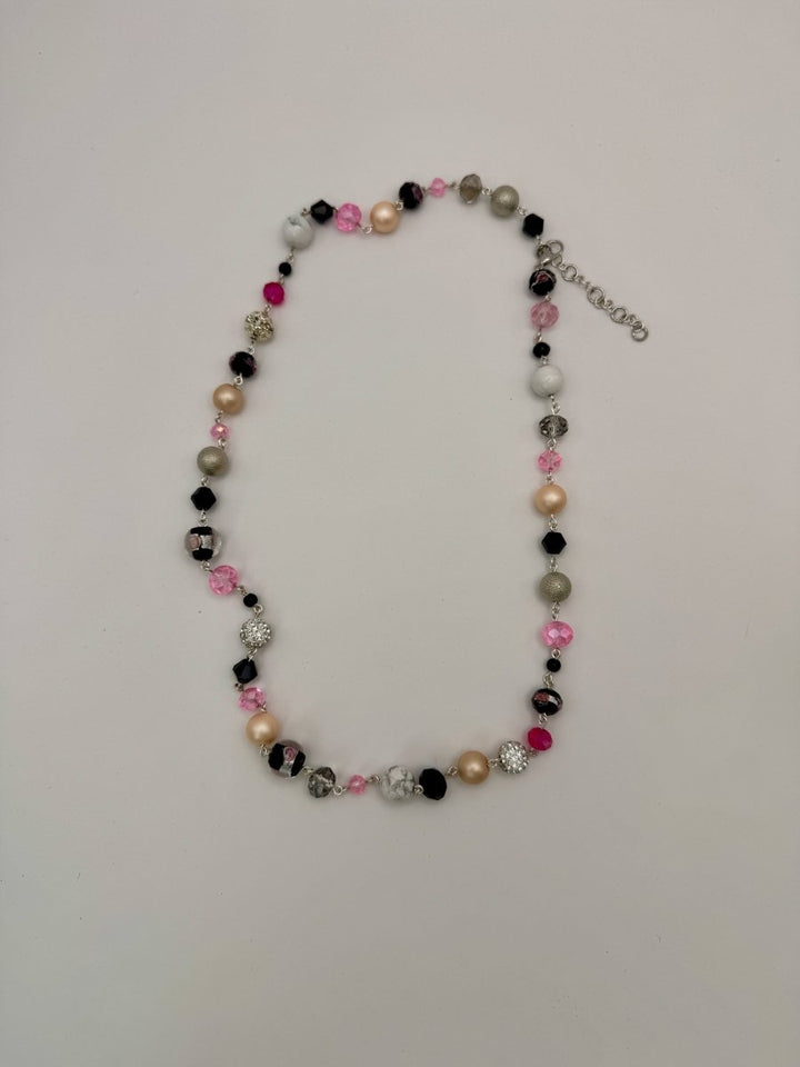Lizzy Lu Diva Necklace in Blush Noir — flat lay showing the bead arrangement and extender chain