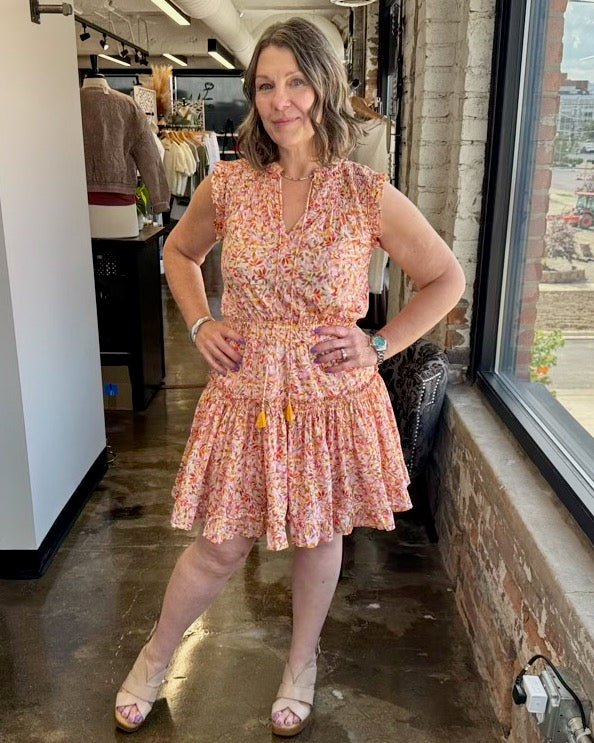 Dear John Denim Melodie Ruffle Cotton Dress in Superbloom Print, tiered ruffle skirt, smocked waist, front view on model