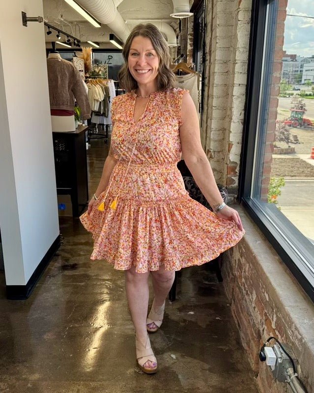 Dear John Denim Melodie Ruffle Cotton Dress in Superbloom Print, relaxed fit with tiered ruffle skirt, front view on model