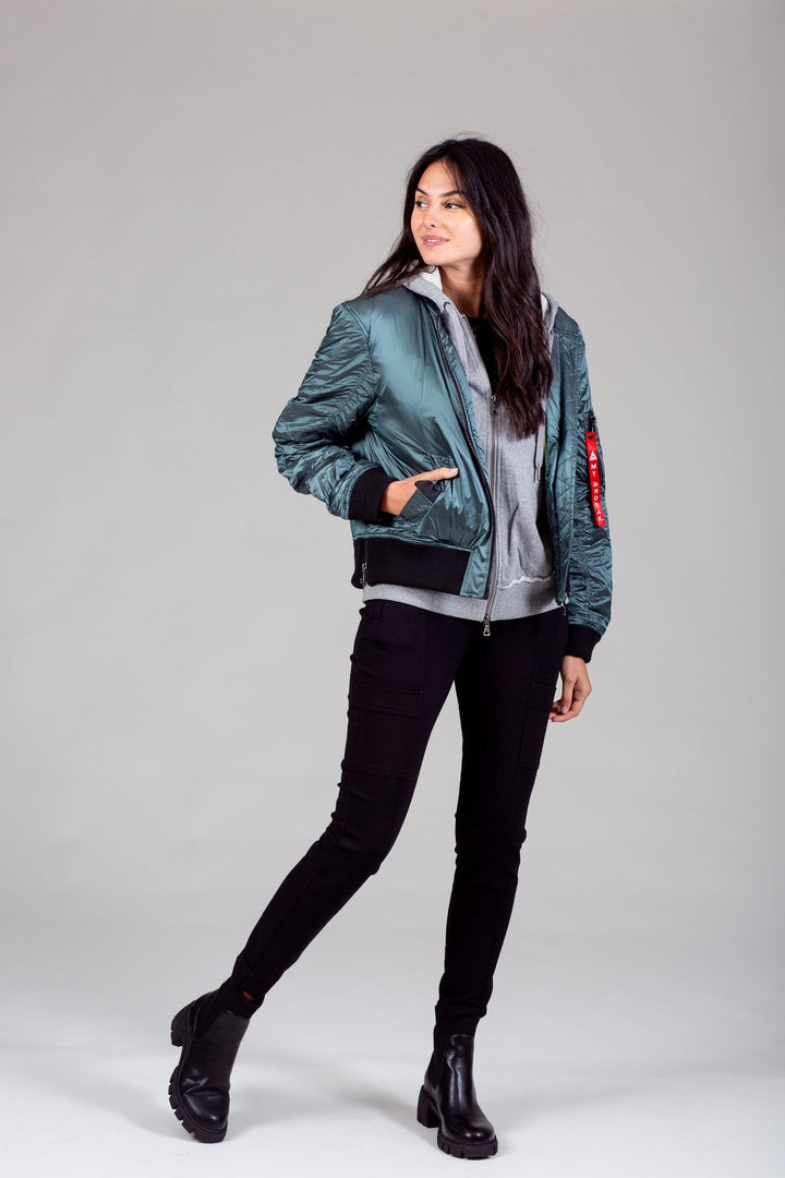 Iridescent Hooded Down Bomber Jacket in Kryptonite — full outfit view on model styled with black skinny jeans and ankle boots