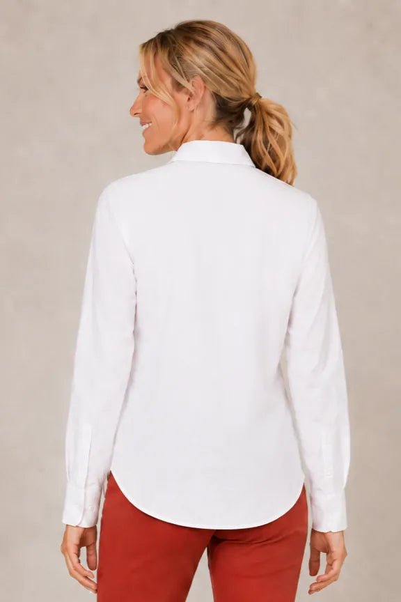 Poplin button Front Top in White — back view showing smooth back and rounded shirttail hem