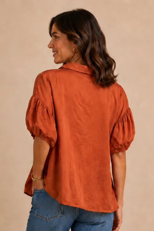 Shirred Puff Sleeve Button-Front Shirt in Bombay Brown — rear view showing loose drape and puff sleeves